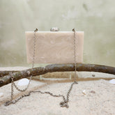 The Rhea Clutch in Silver